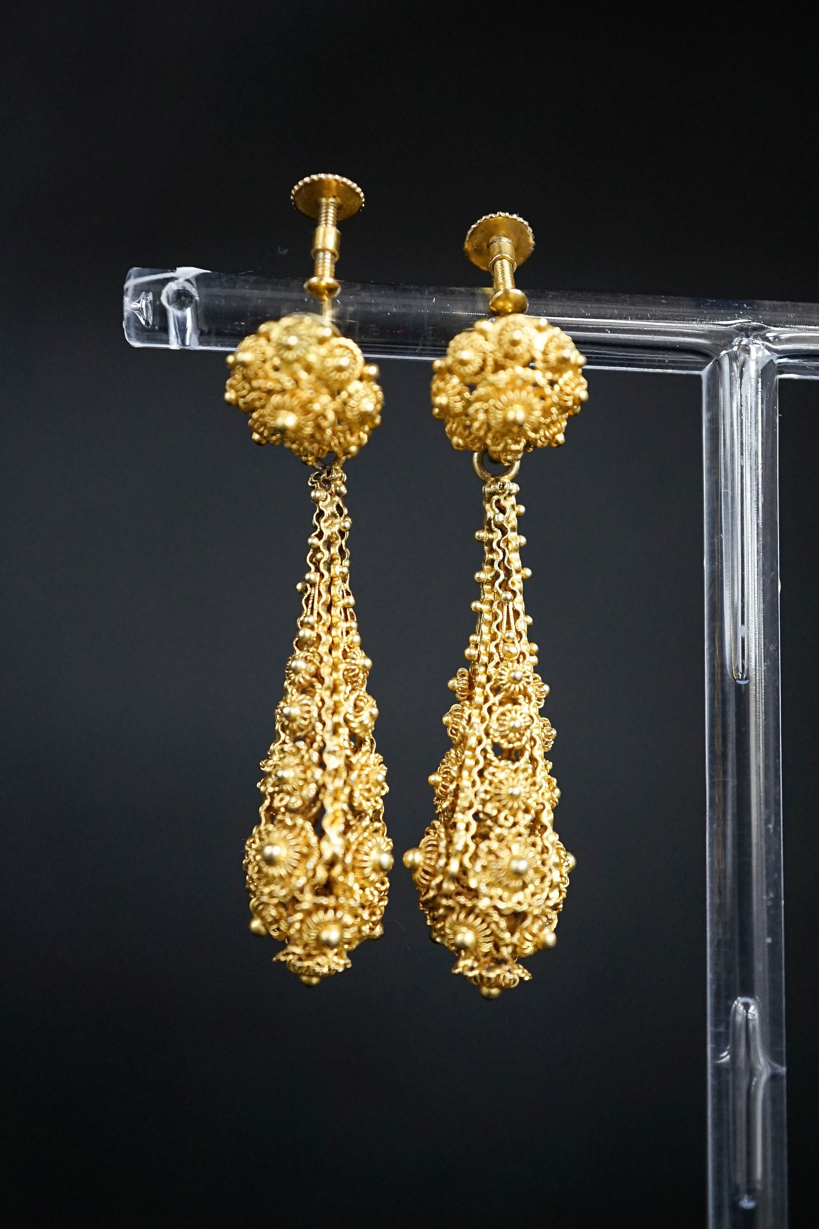 A pair of antique yellow metal filigree cannetile work teardrop shaped earrings, 45mm. 4.6cm.